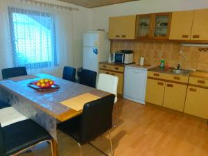 Kuchyň nebo kuchyňský kout v ubytování Apartman Arija-Pino