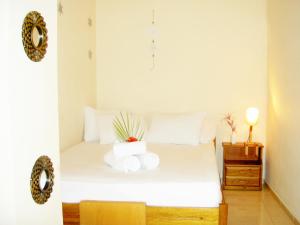 A bed or beds in a room at Mat Old Town Apartments A