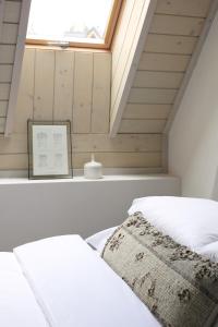 Llit o llits en una habitació de Górski Domek Zakopane