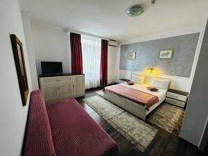 Voodi või voodid majutusasutuse Hotel Suprem toas