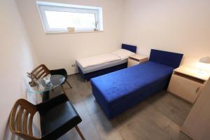 Postel nebo postele na pokoji v ubytování Apartmány Vír