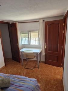 A bed or beds in a room at Apartamento Malaga Aeropuerto