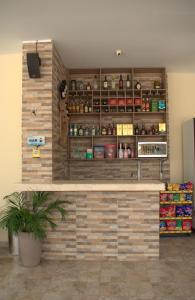 a store with a counter with food on it at Cabañas covemar in Coveñas