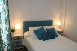 Łóżko lub łóżka w pokoju w obiekcie APARTAMENTOS RURALES ( LA COBIJÁ) APART Nº2 CONIL