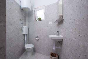 Koupelna v ubytování Apartments Nikolic