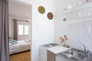 Postel nebo postele na pokoji v ubytování Apartments Nikolic