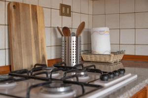A kitchen or kitchenette at Svevo, rustico centrale con parcheggio a Trieste