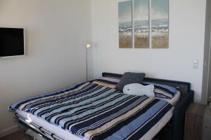 Postel nebo postele na pokoji v ubytování Ferienwohnung-Meeresrauschen
