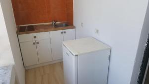 Kuchyň nebo kuchyňský kout v ubytování Villa-Hotel Ludianna