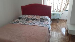Postel nebo postele na pokoji v ubytování Villa-Hotel Ludianna