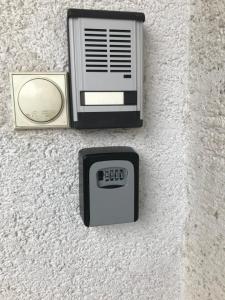 an electronic device on the side of a wall at Apartman EXCLUZIV in Prijedor