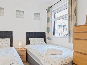 Postel nebo postele na pokoji v ubytování Self Catering Belfast Apartment