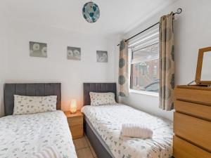 Postel nebo postele na pokoji v ubytování Self Catering Belfast Apartment