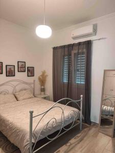 Postel nebo postele na pokoji v ubytování Paradise House