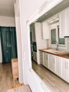 Kuchyň nebo kuchyňský kout v ubytování Paradise House
