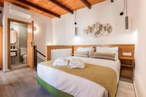 Ένα ή περισσότερα κρεβάτια σε δωμάτιο στο Casa Nicola's