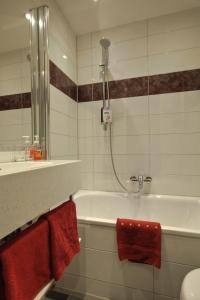Um banheiro em Hotel Condor
