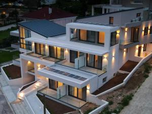 an aerial view of a house with lights on it at CITY HILL Luxury Apartments in Ioannina