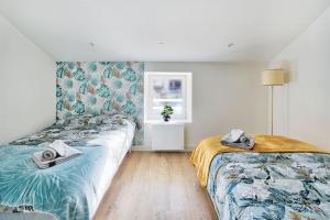 Postel nebo postele na pokoji v ubytování appartement Karibu à Lagnieu