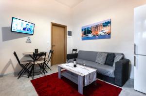 A television and/or entertainment centre at Eddy's Apartment