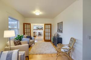 a living room with a couch and a chair at Indiana Vacation Rental - Walk to Syracuse Lake! in Syracuse