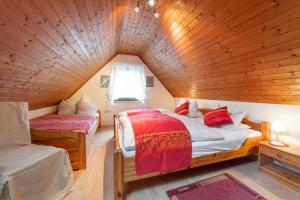 Ein Bett oder Betten in einem Zimmer der Unterkunft Ferienhaus Trautner