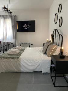 Giường trong phòng chung tại Il Vecchio Casale B&B