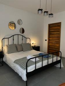 Postel nebo postele na pokoji v ubytování Il Vecchio Casale B&B