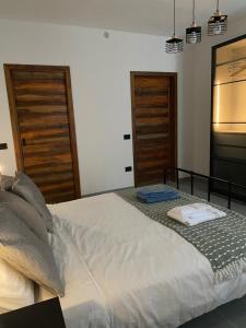Giường trong phòng chung tại Il Vecchio Casale B&B