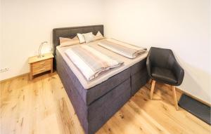 A bed or beds in a room at Ferienwohnung In Braz
