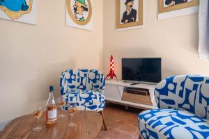 TV a/nebo společenská místnost v ubytování Mille Sabords 4 pers à 20 minutes de Beauval
