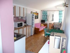 Kuchyň nebo kuchyňský kout v ubytování Apartments KIRSCHEY