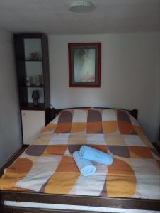Letto o letti in una camera di Apartmani Dunav Apatin