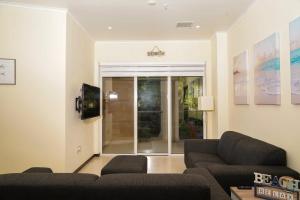 Posezení v ubytování Elegant apartment in eagle beach levent