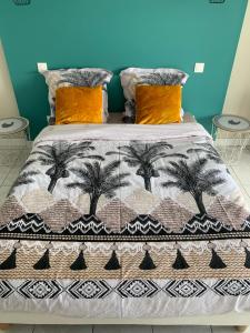 Voodi või voodid majutusasutuse Studio PeTiT CoCon Anse Mitan Trois Ilets toas