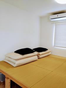 Ένα ή περισσότερα κρεβάτια σε δωμάτιο στο TANDI GA TANDI - Vacation STAY 12993