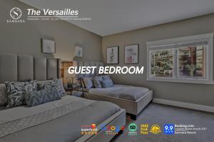 The Versailles by Samsara Resort Top Luxury Top View 1300SQF 2BEDROOM 2BATHROM客房内的一张或多张床位