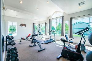 a gym with several treadmills and elliptical machines at Coolidge 3bd 2ba upgraded apartment with amenities in Coolidge