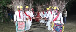 a group of people dressed up in traditional dances at Bardia Wild Side Hotel in Bhurkīā