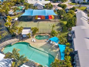 an aerial view of a pool at a resort at Sun Drenched Unit in Noosaville in Noosaville