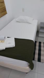 A bed or beds in a room at Casa de Mia
