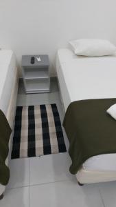 A bed or beds in a room at Casa de Mia