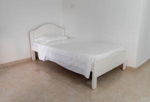 Letto o letti in una camera di Casa Toboro