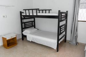 Letto o letti in una camera di Casa Toboro
