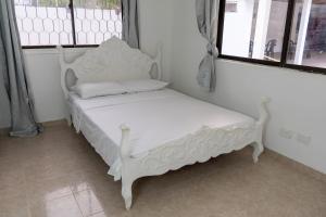 Letto o letti in una camera di Casa Toboro