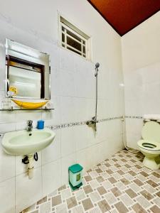 Koupelna v ubytování DK House Homestay + 37 fotografií