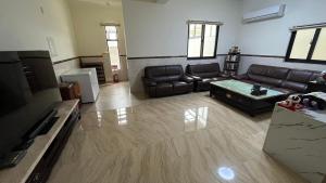 אזור ישיבה ב-Sharkat Homestay