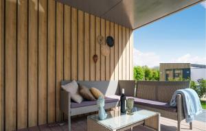 Μπαλκόνι ή βεράντα στο Nice Home In Heinkenszand With Sauna +21 φωτογραφίες