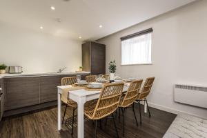 a kitchen and dining room with a table and chairs at Host & Stay - The Scandi Hideaway in Liverpool