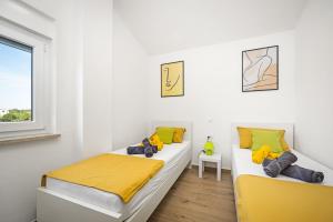 Postel nebo postele na pokoji v ubytování Luxury apartments Lotus&Lovor